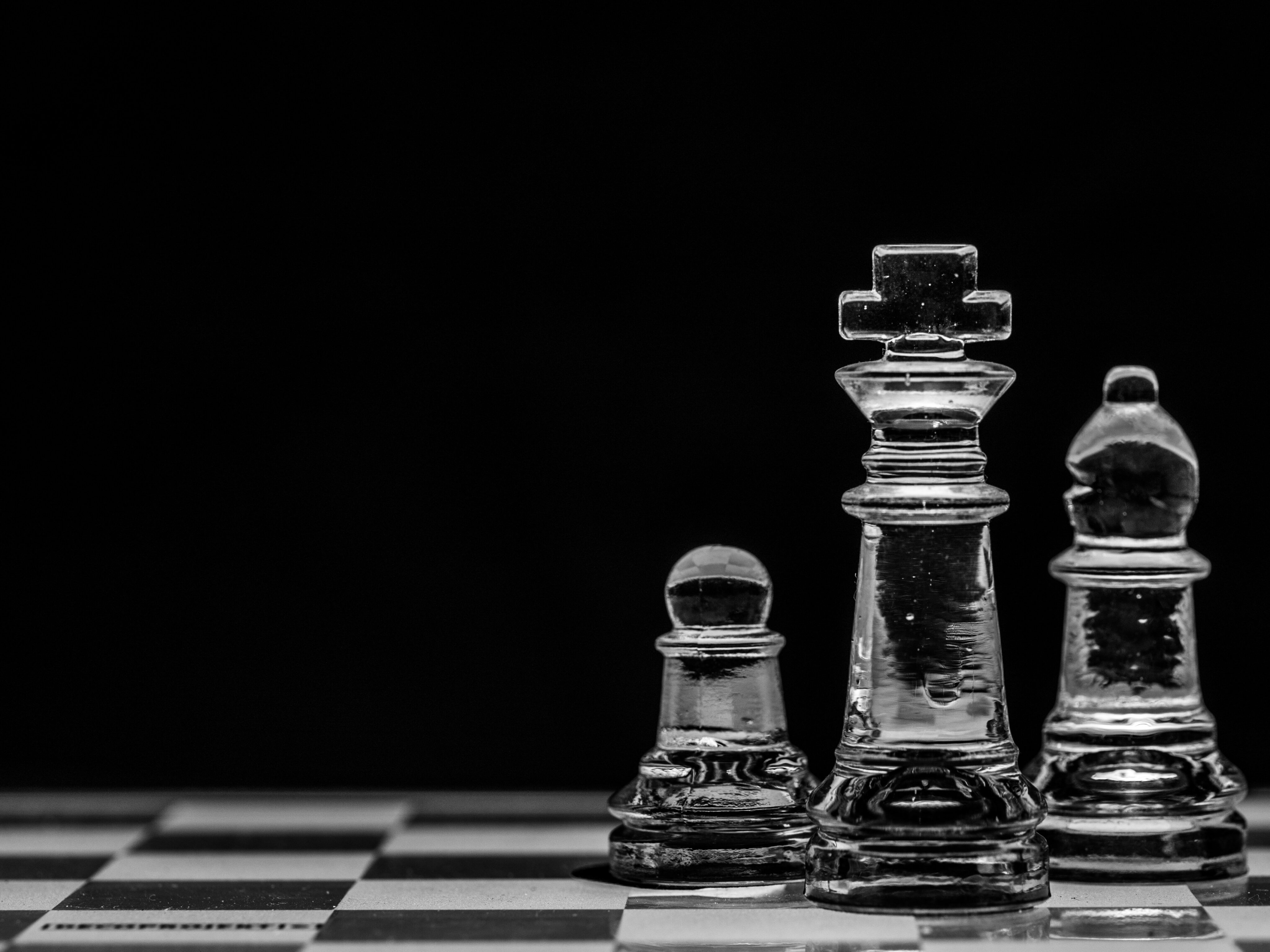 Chess pieces arranged on a board, symbolising strategy, planning, and decision-making in business.